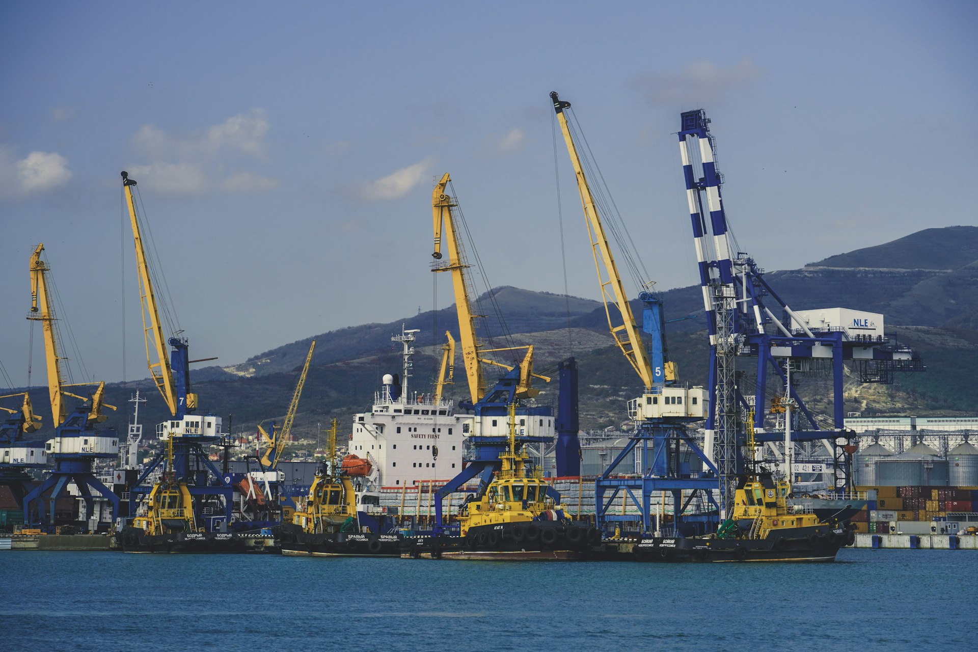 a group of boats that are sitting in the water